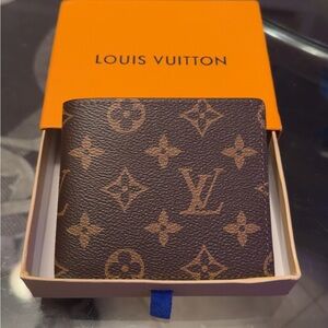Louis Vuitton Monogram Canvas Wallet in Brown